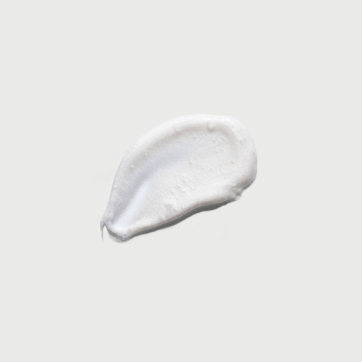 the-smoother-glycolic-acid-exfoliating-body-wash-b3 NATR-40002-Swatch-The-Smoother-Glycolic-Acid-Exfoliating-Body-Wash-bonebkgd.jpg