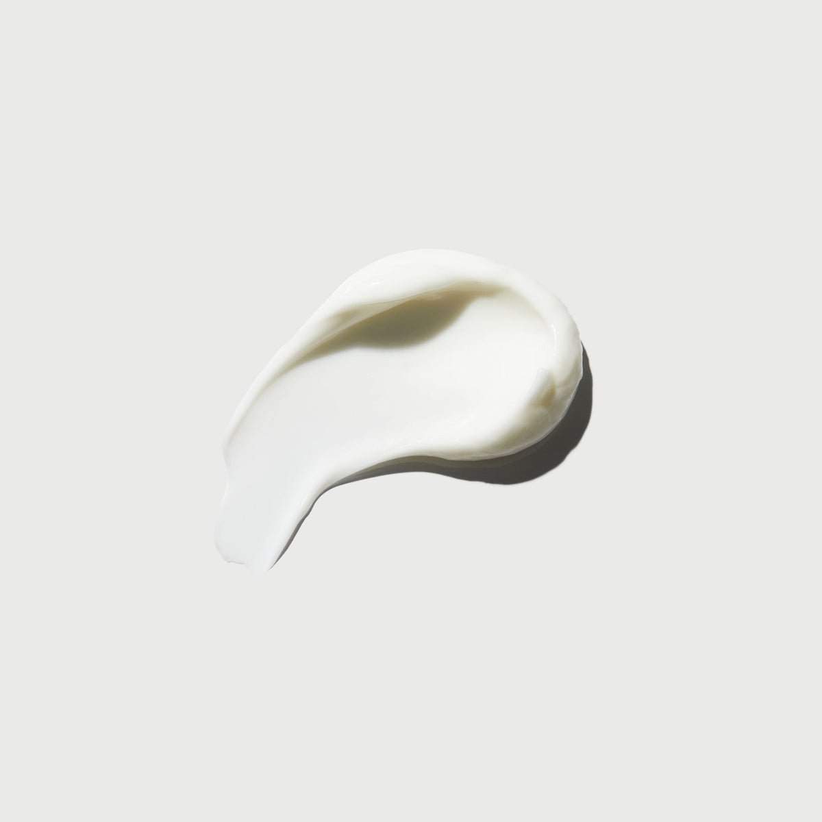 the-smoother-glycolic-acid-body-lotion-e8 NATR-40014-Swatch-The-Smoother-Glycolic-Acid-Body-Lotion-bonebkgd.jpg