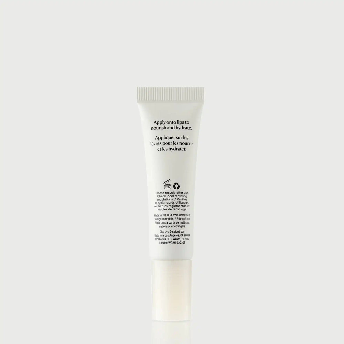 phyto-glow-lip-balm-clear-v1 NATR-60066_PhytoGlow_Clear_primary_capon_back-bonebkgd.webp